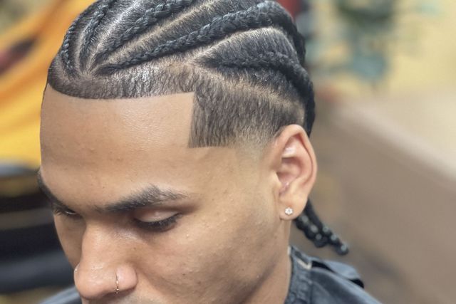 Professional cornrow braids and lineup - mobile barber hotel service